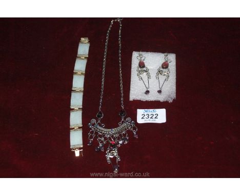 A 925 silver jade bracelet and a necklace and earrings set.