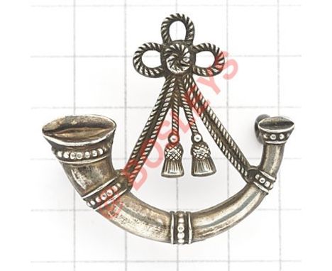 Oxfordshire & Buckinghamshire Light Infantry silver Officer’s cap badge. Good die-cast strung bugle. Reverse impressed “STERL