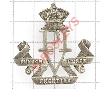 Indian Army. 1st Punjab Volunteer Rifles Victorian Officer’s cap badge. Hollow native silver. Crowned PI/V resting in ornate 