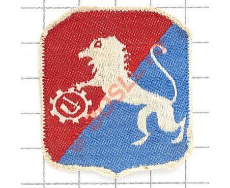 6th Lwow Polish Infantry Brigade WW2 cloth formation sign. White lion holding gear wheel with Armoured Corps device to centre