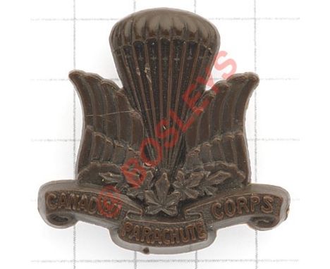 Canadian Parachute Corps scarce WW2 plastic economy cap badge.  Integral loops VGC 