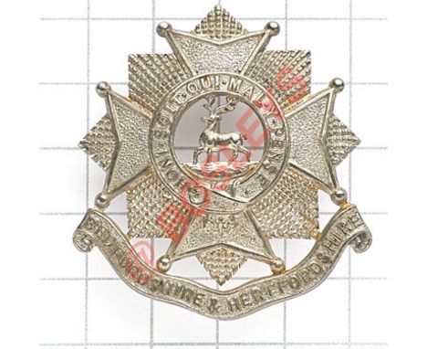 Bedfordshire & Hertfordshire Regiment WW2 Officer’s silver cap badge. Die-cast example. Reverse impressed “STERLING”. J.R. Ga