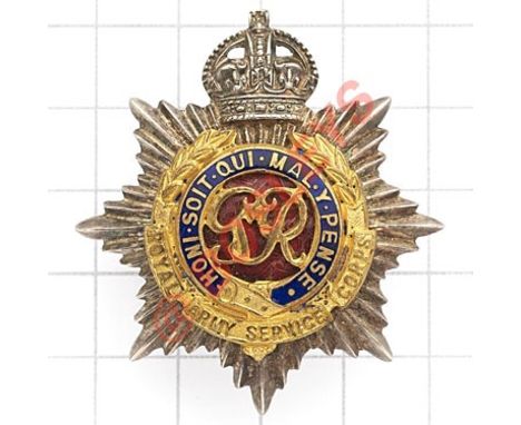 Royal Army Service Corps Officer’s cap badge circa 1948-52. Silvered Crowned star mounted with gilt wreath and title scroll e