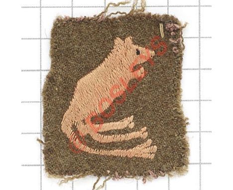 7th Armoured Division early WW2 cloth formation sign.  Pinky red Jerboa (“Desert Rat”) embroidered on khaki felt rectangle.  