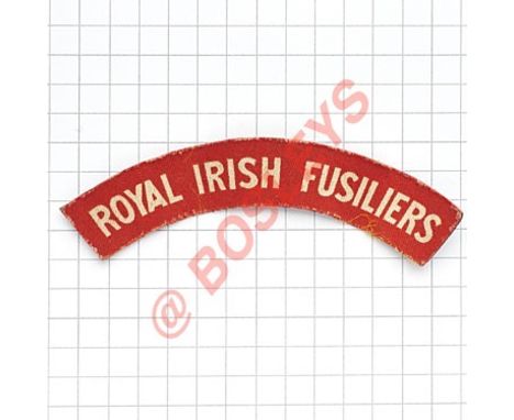 ROYAL IRISH FUSILIERS WW2 printed cloth shoulder title.  White on red  Removed from uniform VGC 