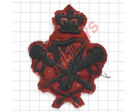British Army Victorian bandsman’s scarce proficiency arm badge. Heavily black embroidered crowned crossed trumpets, harp to c