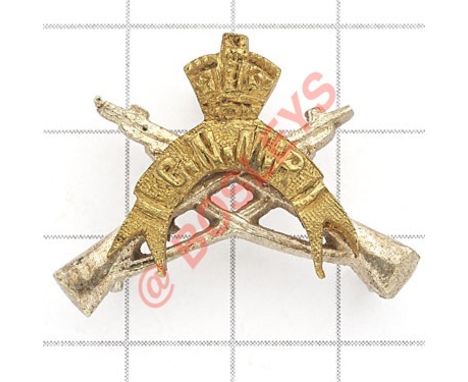 Indian Army. Chota Nagpur Mounted Rifles cap badge. Well cast brass crowned CNMR scroll on white metal crossed rifles  Loops 