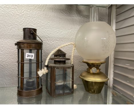 MILLER &amp; SONS OIL LAMP AND TWO REPRODUCTION HANGING CANDLE LANTERNS