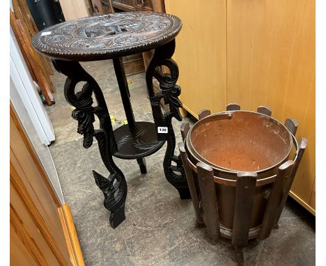 CARVED EBONISED CIRCULAR TABLE AND PLANTER TROUGH 