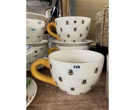 TWO BUMBLEBEE DESIGN OVERSIZED TEACUP AND SAUCER PLANTER SETS (AND ONE SPARE TEACUP)