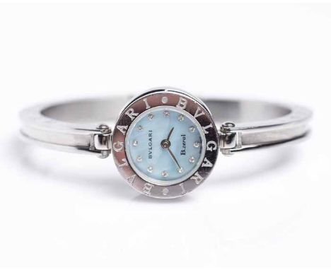 LADY'S STAINLESS STEEL BULGARI B.ZERO1 BANGLE WRISTWATCH
quartz movement, the blue mother of pearl dial with diamond hour mar