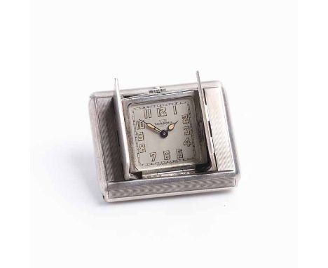 LADY'S ART DECO STERLING SILVER TAVANNES PURSE WATCH
signed fifteen jewels manual wind movement numbered 121097, the signed s