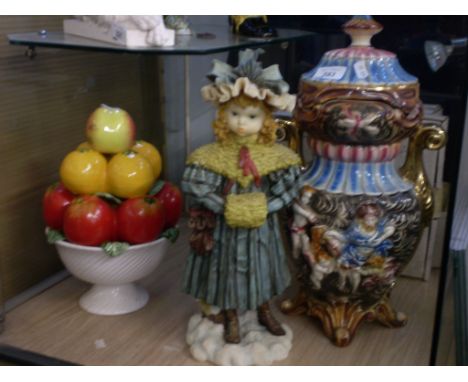 CERAMIC FRUIT IN BOWL, FIGURE OF A GIRL (37 CM) AND A VASE WITH CHERUB DECORATION (42 CM)  