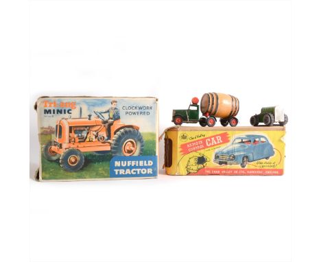 Tri-ang Minic clockwork powered Nuffield Tractor, boxed, Tri-ang large Excavator, boxed, Tri-ang Minic truck with barrel, Tri