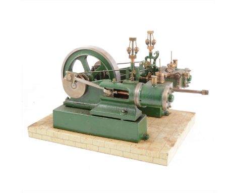 A well-built twin-cylinder mill engine; live steam model, 1inch scale, with 5 1/2inch flywheel, mounted on wooden base, built