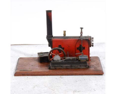 A Stuart Turner S50 horizontal live steam mill engine; single cylinder, 3.5inch flywheel, length 22cm, mounted on wooden base