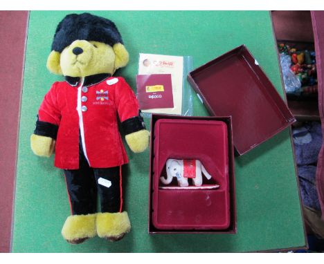 A Merrythought Soft Toy Teddy Bear in the Style of a Coldstream Guard NWS Bank PLC Branding to Tunic, measuring  approximatel