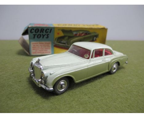 A Boxed Corgi No. 224 Diecast Model Bentley Continental Sports Saloon, two tone green, red interior, opening boot with spare 
