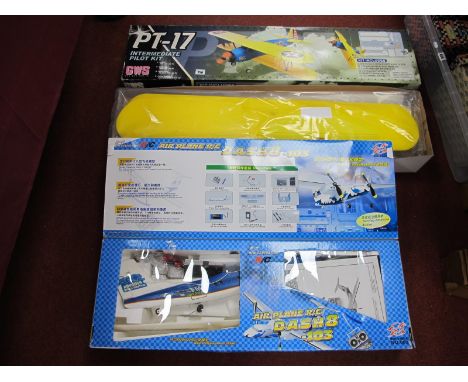 Two Radio Controlled Model Aircraft Kits, comprising of a Red Horse Airplane R/C Dash 8-103, R/C Dash 8 controller, AGWS #GWS