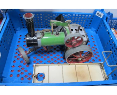 A Mamod Steam Tractor Engine, burner and scuttle present, signs of use, unboxed.