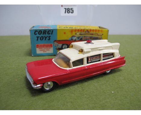 a Boxed Corgi No. 437 Diecast Model Superior Ambulance, cream over red body, small chips to paint work noted, sellotape,colou