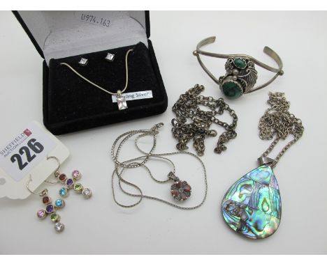 A Malachite Inset Bangle, of openwork design, together with a shell pendant, a marcasite set pendant, multi set cross earring