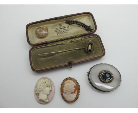 A Victorian Oval Panel Brooch, collet set; together with an oval shell carved cameo brooch / pendant, a stick pin, 'Rest In P