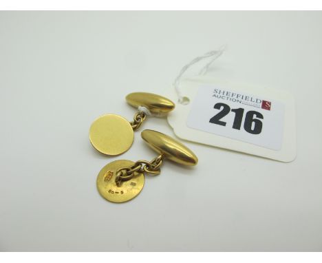 A Pair of Vintage Cufflinks, the plain circular panels stamped "18ct" (6.8grams). 