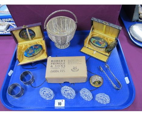 A Swing Handled Sugar Basket, with clear glass liner (damages); hallmarked silver napkin rings, four glass salts, vintage mir