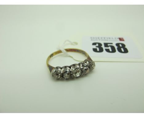 A Five Stone Diamond Ring, the old cut stones claw set between tapered shoulders, stamped "18ct &amp; Plat" (finger size M) (