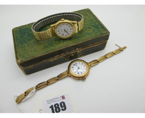 A Vintage 9ct Gold Cased Ladies Wristwatch, the white dial with black and red Roman numerals within plain case (import marks 