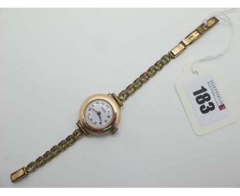 Rolex; A Vintage 9ct Gold Cased Ladies Wristwatch, the signed white dial with black Arabic numerals, the movement stamped "Ad