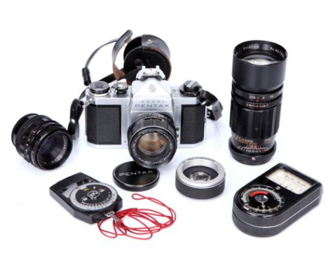 An Asahi Pentax SV SLR Camera, with Super-Takumar f/1.8 55mm, Soligor f/3.5 35mm and f/3.5 180mm lenses, together with two li