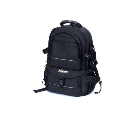 A Nikon Backpack, with tripod strap to one side