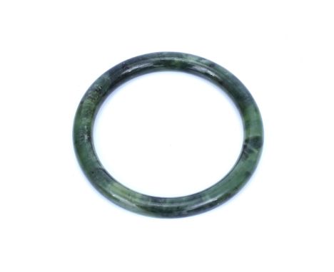 A Chinese Jade / Jadeite Bangle,  85mm overall diameter