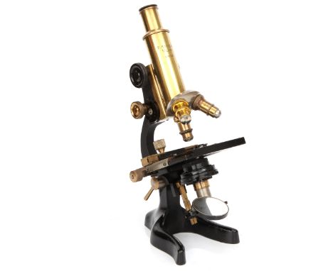 A Spanish Koristka Microscope, black enamel and brass, signed 'F. Koristka, Milano,' with 3 objectives