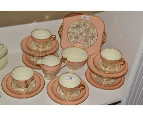 A Shelley tea service, cream and pink decoration, picked out in gilt, pattern no.12822/59,  c.1930