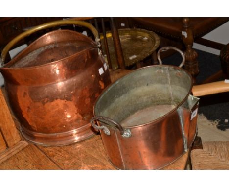 A copper helmet shaped coal scuttle';  an oval copper pan (2)