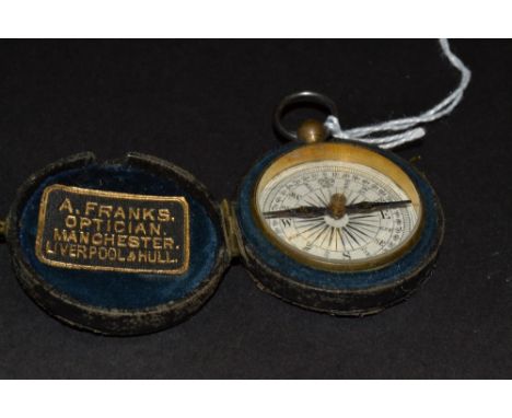 A pocket brass compass by A Franks Optician cased