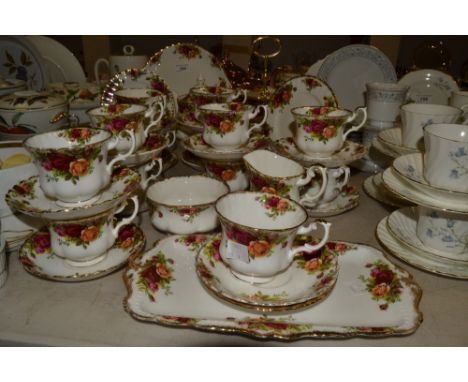 A Royal Albert Old Country Roses tea service for twelve, comprising of teapot,milk and sugar, cake stand ; etc 