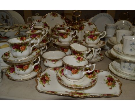 A Royal Albert Old Country Roses tea service for twelve, comprising of teapot,milk and sugar, cake stand ; etc 