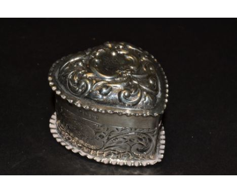 A Victorian silver heart shaped trinket box, embossed with scrolling foliage , London 1859 