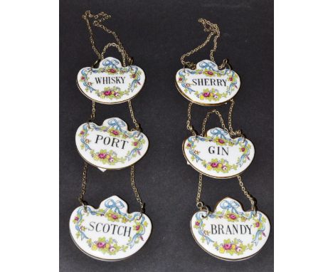 A set of six Coalport bottle labels Gin, Sherry, Port, Whisky, Scotch, Brandy, surrounded by a floral band, printed marks (6)