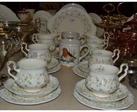 A Royal Albert Caroline pattern tea set for six, cups, saucers, tea plates, milk, sugar, bread and butter plate, two Denby mu