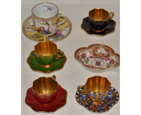 A set of three Coalport cabinet cups and saucers, in ruby red , cobalt blue and emerald green, gilt interiors; another ; a Dr