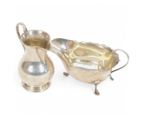 Edwardian silver cream jug, of plain waisted form with C handle, upon stepped circular foot, hallmarked Pearce & Son, Chester