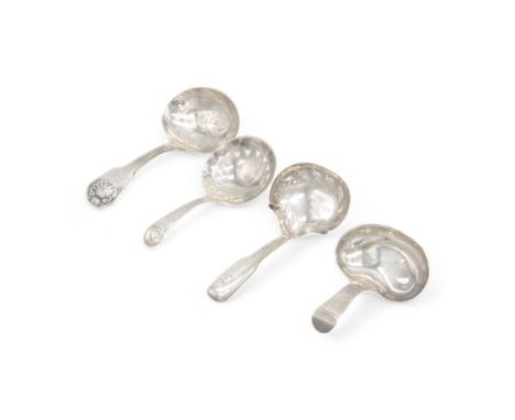 Four Georgian silver caddy spoons, comprising a George III kidney shaped example with pin prick decoration to handle, hallmar