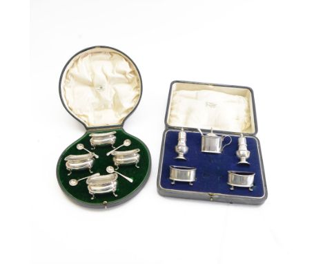 Set of four early 20th century open salts, of oval form with oblique gadrooned rims, upon four paw feet, hallmarked Mappin & 