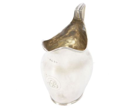George III silver cream jug, of helmet form, with engraved monogram to body, hallmarked London 1797, makers mark indistinctCo