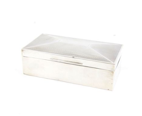1930s silver mounted cigarette box, of rectangular form with engine turned decoration to hinged cover, opening to reveal a so